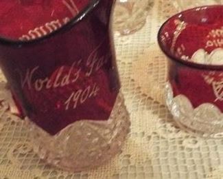 129.  2 ANTIQUE RED/CLEAR PIECES 1904 WORLD'S FAIR PITCHER & ETCHED CUP   $25.00