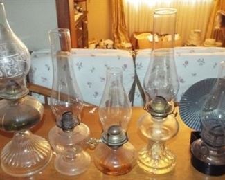 40.  OIL LAMPS; LEFT TO RIGHT 1-5  $40.00 EACH