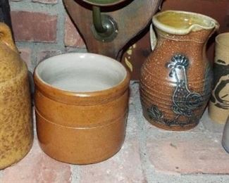 169.  5 POTTERY PIECES LEFT TO RIGHT;  YELLOW JUG $15.00, BROWN POT $10.00, ROOSTER PITCHER $10.00, FROG CUP $7.00, TREE MUG $5.00