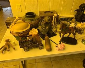 Remington art statue, pottery, iron circus truck, wooden monkey