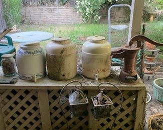 crocks, antique water pump, candle sconce patio lanterns 
