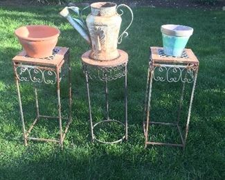 Item #62:  Set of three wrought iron tables w/planters.  (not in great shape but very shabby chic).  $20