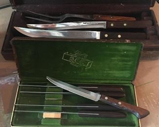 Item #70:  Set of steak knives and assorted Flint carving knives (2 cases total) $10