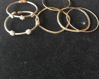 Item #122:  Set of six goldstone bracelets: $6
