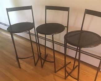 Item #142:  Set of 3 metal bar stools.  Apprx. 24"H.  Seat is 15" round.  $50