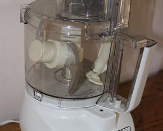 $75. Cuisinart. Custom Prep 11 Food Processor. With all blade attachments and extra mixing bowl.