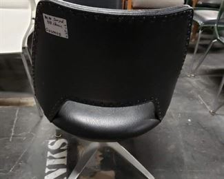 (1) Vintage MCM black vinyl padded swivel chair with studs $135