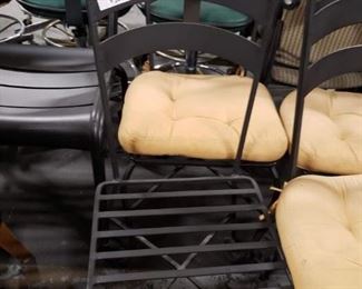 (4) Black Wrought Iron heavy steel indoor outdoor stack chairs $300 for 4