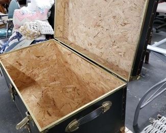 Vintage Black Vinyl with brass hardware trunk Measures: 31.25"W x 17"D x 15.5"H closed Call