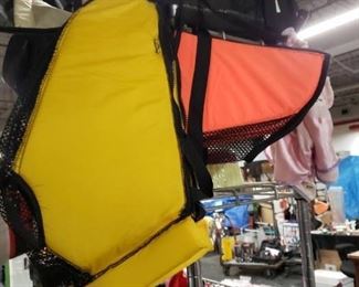2 Dog floating vests  (1) Yellow Med (1) Orange Small $15 each 2/$25