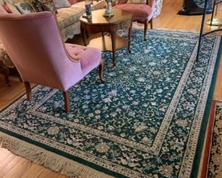 #50	(2) armless velvet button back and seat side chairs $75 ea. 	 $150.00 
#52	green rose machine rug 70x110	 $65.00 
