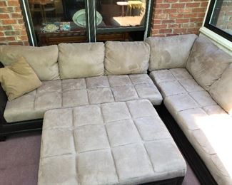 Upholstered sectional with ottoman $180