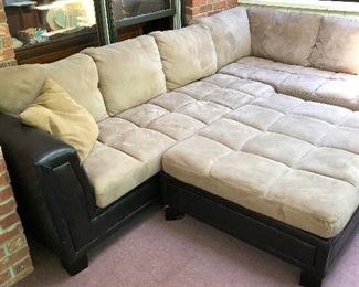 Upholstered sectional with ottoman $180