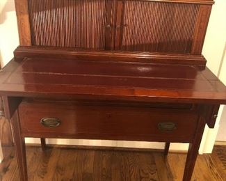 One of many gorgeous antique mahogany pieces! This is a lovely leather top secretary 