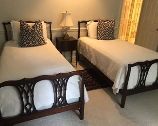 Two twin size mahogany twin beds