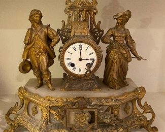 Antique Napoleon III gilded brass figural mantle clock