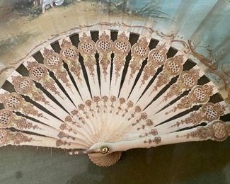 Antique hand carved and gilded ivory fan