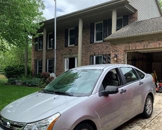 2009 Ford Focus SE Sedan 5-Speed Transmission, single owner estate car, 83,350 miles, clean Carfax report, comes with bike rack and cargo carrier attachments