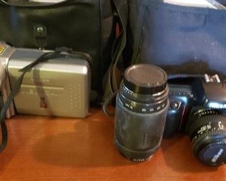 older cameras, lens, bags