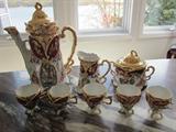 100+ year old China set. Two cups are missing their delicate handles.