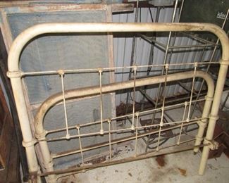 Antique iron bed with rails