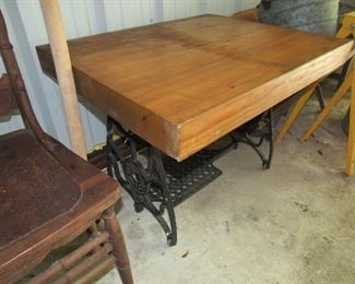 Iron base table with 3" thick wood top