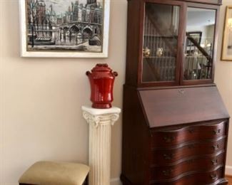 Maddox serpentine  mahogany secretary With glass display, pedestal, red pottery jar with lid, original vintage looking painting, stool with pull out drawer