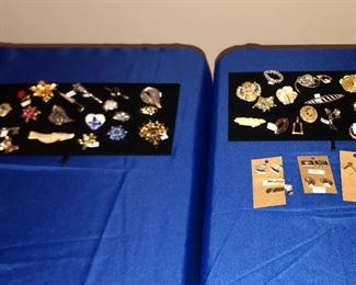 small selection of costume broaches.  