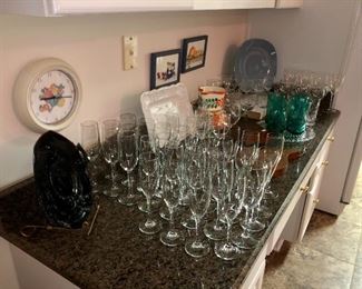 collection of champagne and wine glasses, vintage pottery and serve ware 