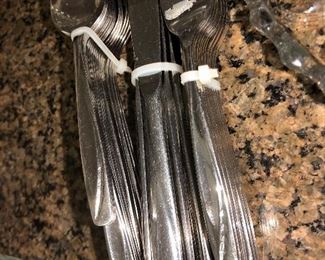 Partial set of stainless flatware