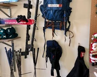 camping gear, ski equipment, luggage rack and golf club