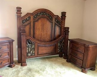 Ashley bedroom suite consisting of queen bed, two nightstands, tall dresser & mirror and large mans chest with drawers and shelves