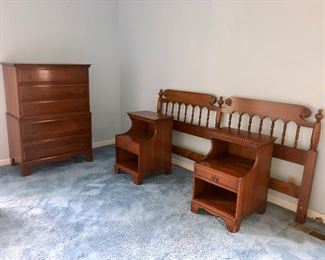 Davis cabinet company cherry mid century bed room suite consisting of king bed frame with headboard, dresser with mirror, chest of drawers and two matching nightstands. 
