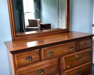 Davis cabinet company cherry mid century bed room suite consisting of king bed frame with headboard, dresser with mirror, chest of drawers and two matching nightstands. 