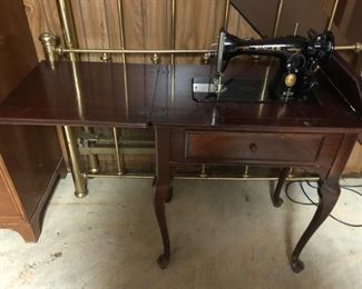 singer sewing machine with mahogany cabinet.  