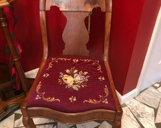 Early empire flame mahogany chair with needlepoint seat.  Estimated to be from early 1800’s. 