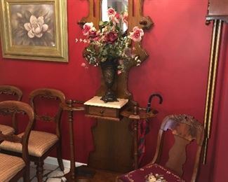 Antique hall chairs, walnut hall tree and bronze vase