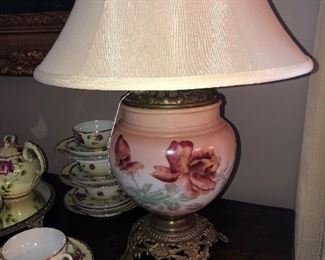 Converted antique oil lamp with fabric shade
