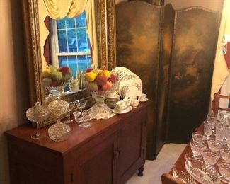 Antique very large mirror, three panel leather hand painted room screen, antique step back base and American Fostoria 
