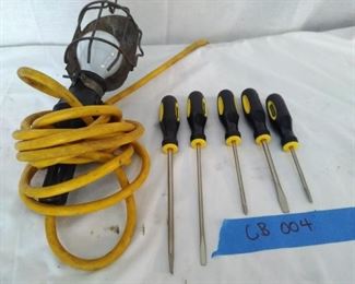 One Shop Light and five stanley screw drivers