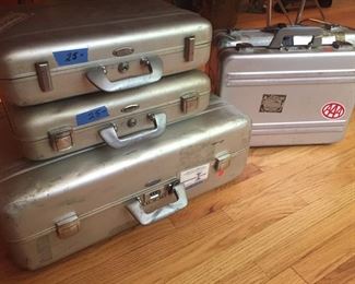 Halliburton aluminum suitcases.