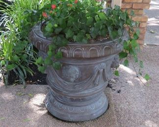 One of two huge planters with plants