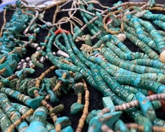 Lots of heshi, turquoise nugget with jackals necklaces.