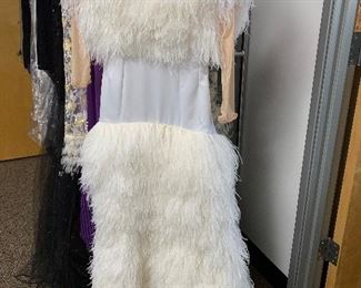 Wow...what an incredible feathered gown!