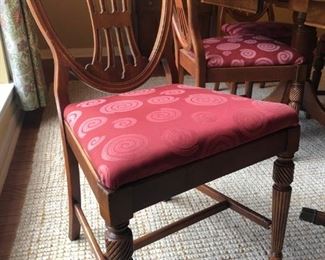 Antique dining room table and 5 chairs (includes leaf and custom table pads; table top has some water marks) $300