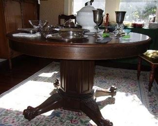 Walnut Claw Foot Dining Table, ca 1900.  48"Dia plus 2 leaves (10"W each) make an oval  (leaves are not original