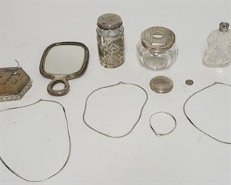 1175 STERLING SILVER LOT, PIN CUSHION IN A STERLING HOLDER, HAIR RECEIVER W/ STERLING LID, STERLING SILVER DRESSER MIRROR & A CUT GLASS FLASK OR PERFUME W/ STERLING TOP, JAR W/ SILVER OVERLAY THREE NECKLACES & A BRACLET, A LID, 1939 DIME