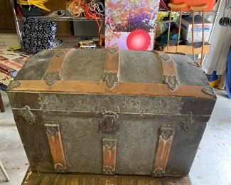 $225- Antique Camelback trunk