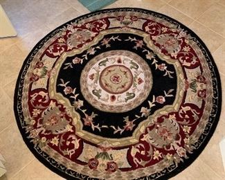 Round rug $100
64 round