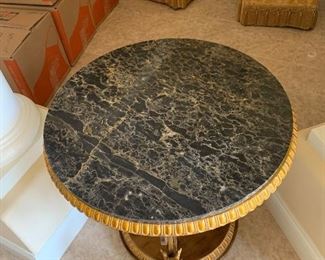 Marble side table $500
27 round 26 tall